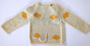NW515 YELLOW COW ON CREAM SWEATER